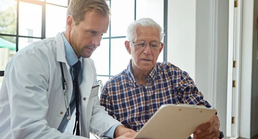 doctor-man-wheelchair-with-clipboard-clinic-consultation-report-medical-review-medic-checklist-person-with-disability-hospital-paperwork-exam-rehabilitation-care